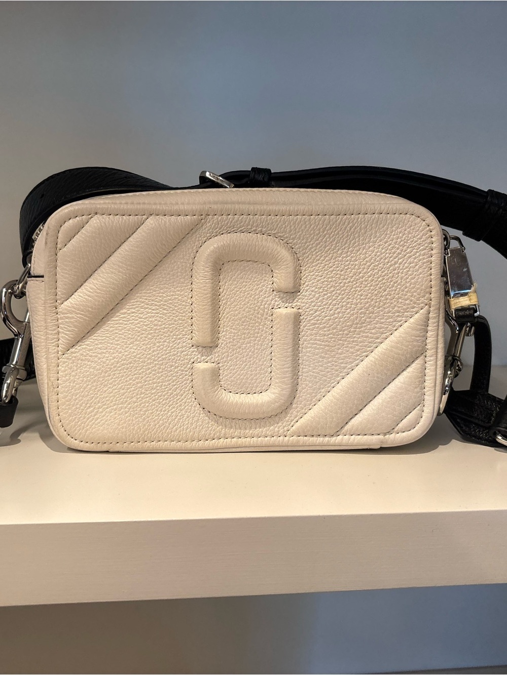 Marc Jacob’s white and black crossbody bag